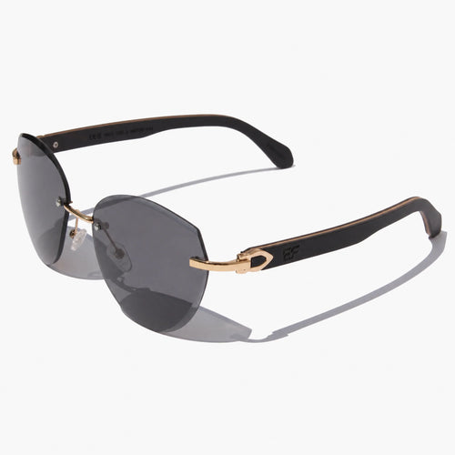 Modern rimless sunglasses featuring grey tinted lenses and gold accents, with wooden temples