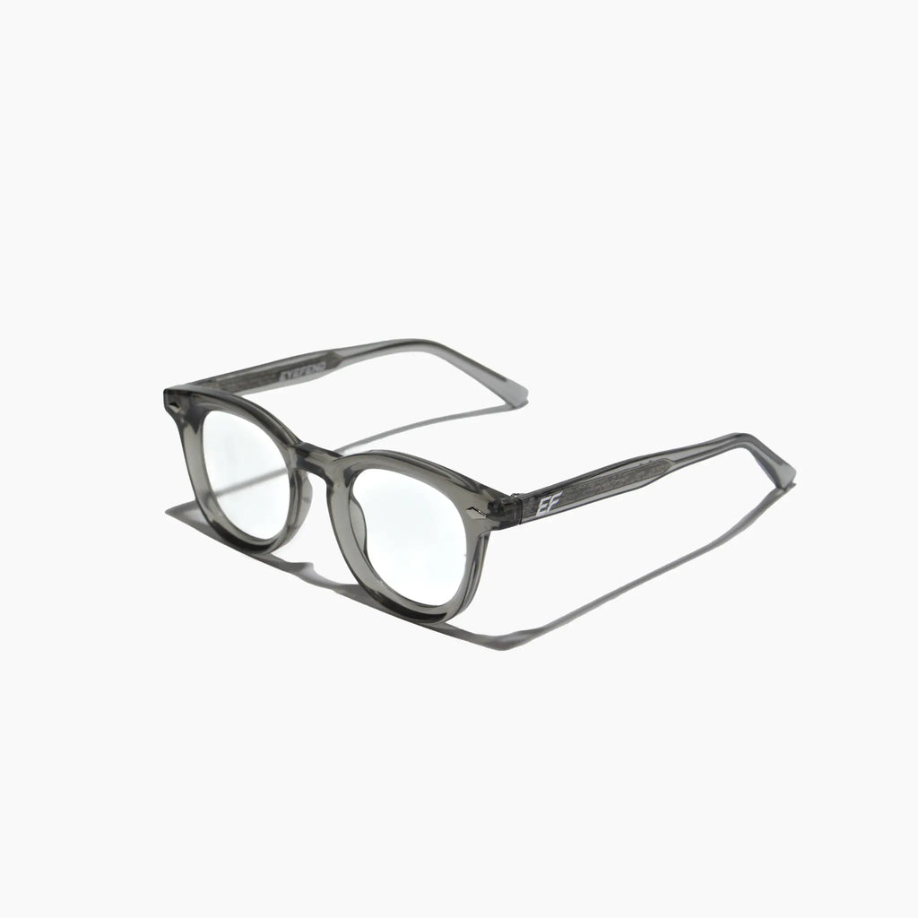 EyeFend premium photochromic blue light glasses in grey, featuring a minimalist structural frame and  reinforced barrel hinges