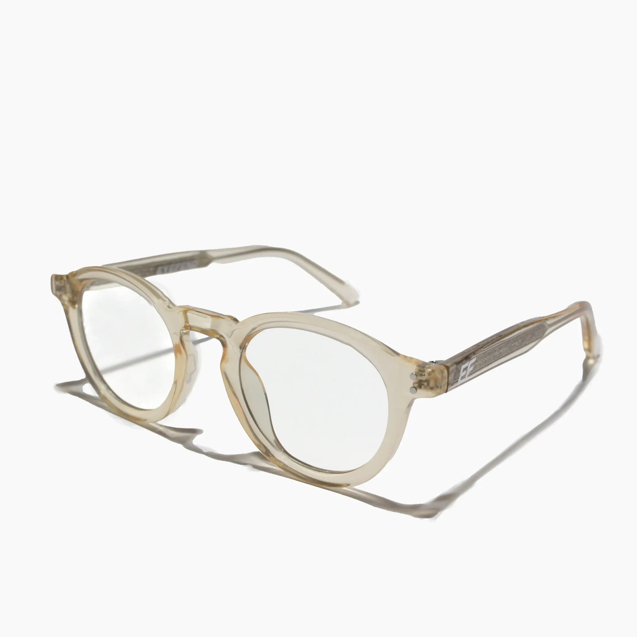 EyeFend premium photochromic blue light glasses in an orange, rounded frame, featuring a minimalist structural design and durable multi-barrel rivet hinges.