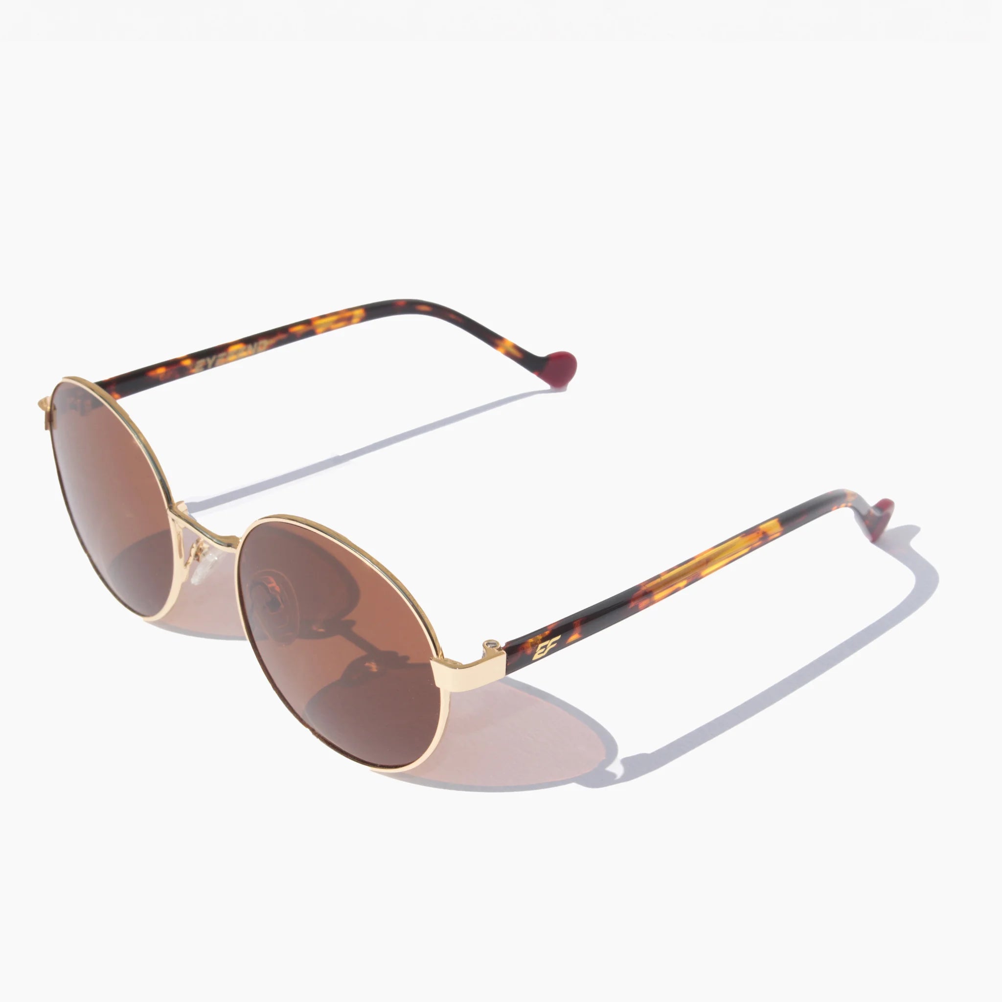 EyeFend Ray retro round sunglasses featuring gold metal wire frames, brown lenses, and tortoiseshell acetate temples
