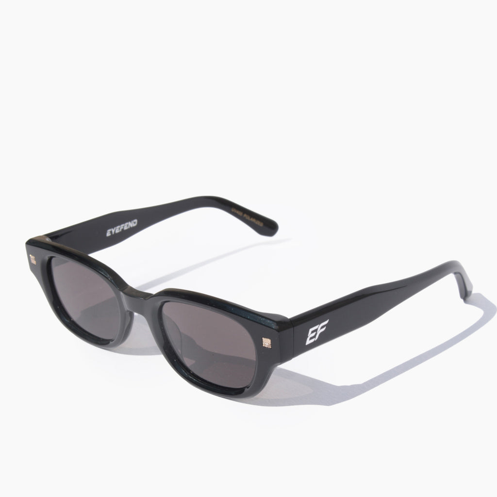 EyeFend Saphir black acetate sunglasses featuring polarized black lenses.