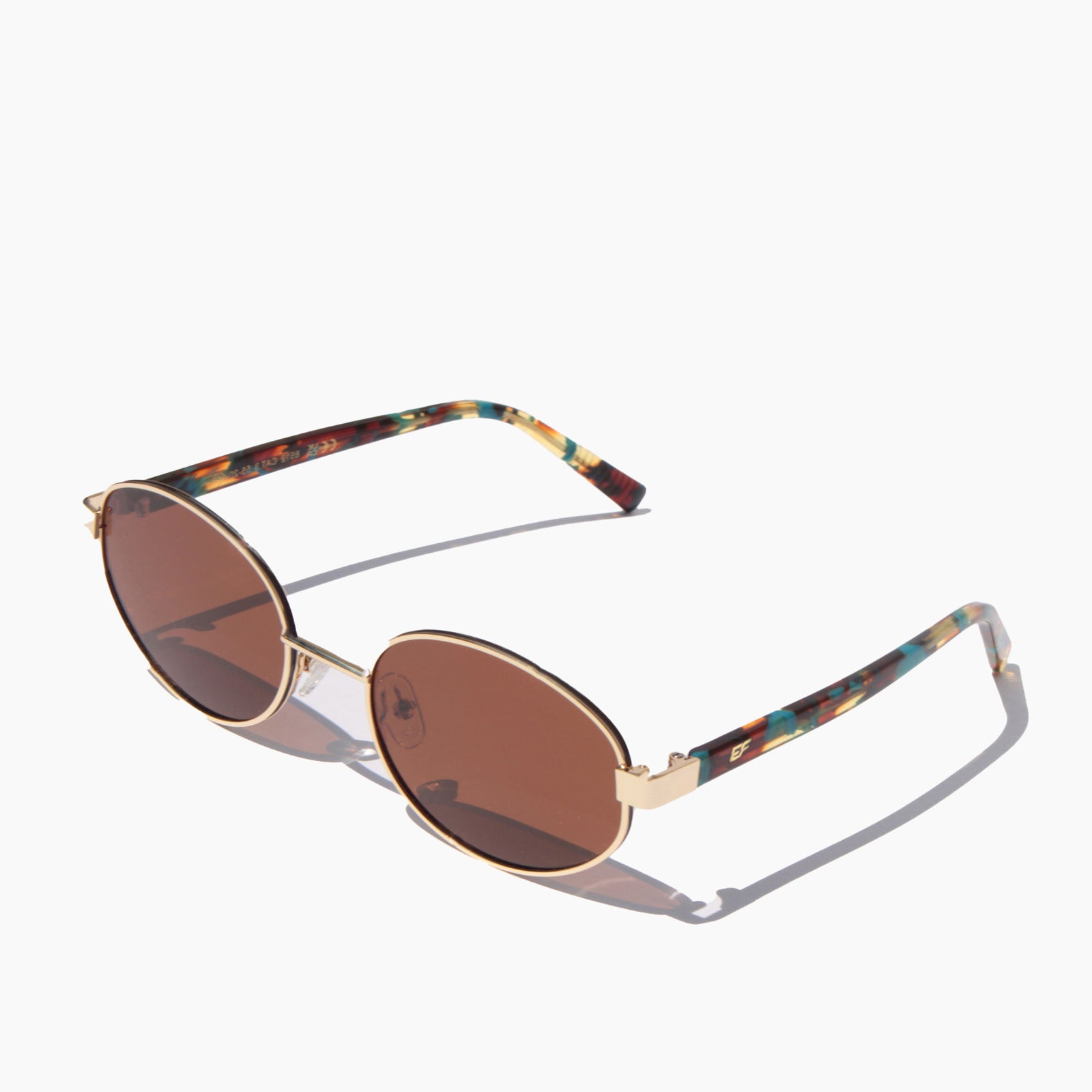 EyeFend Sharp round acetate sunglasses featuring gold metal frames, brown polarized lenses, and multi-colored tortoiseshell temple arms.