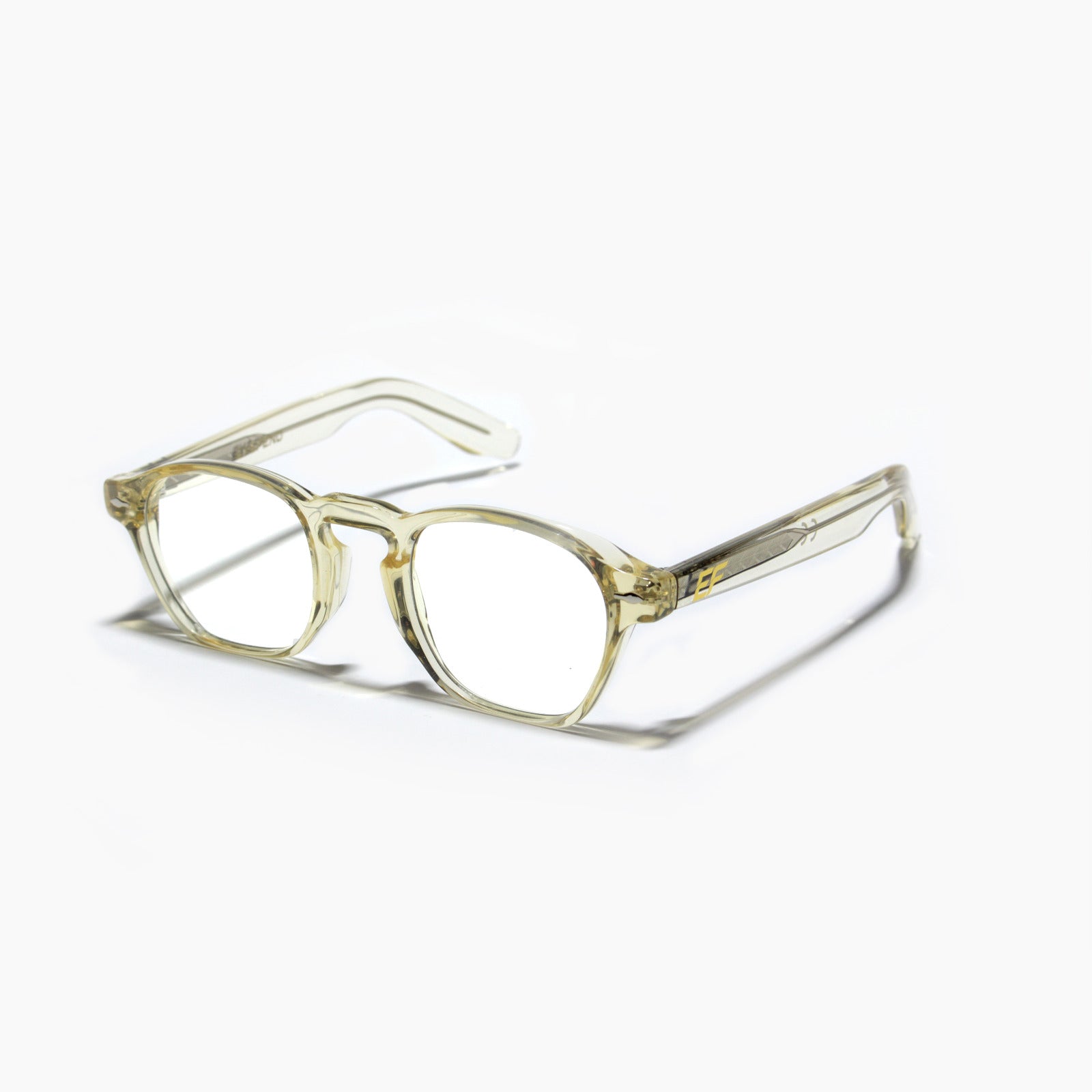 EyeFend premium photochromic blue light glasses in a yellow, retro rounded frame, featuring a minimalist structural design and durable multi-barrel rivet hinges.