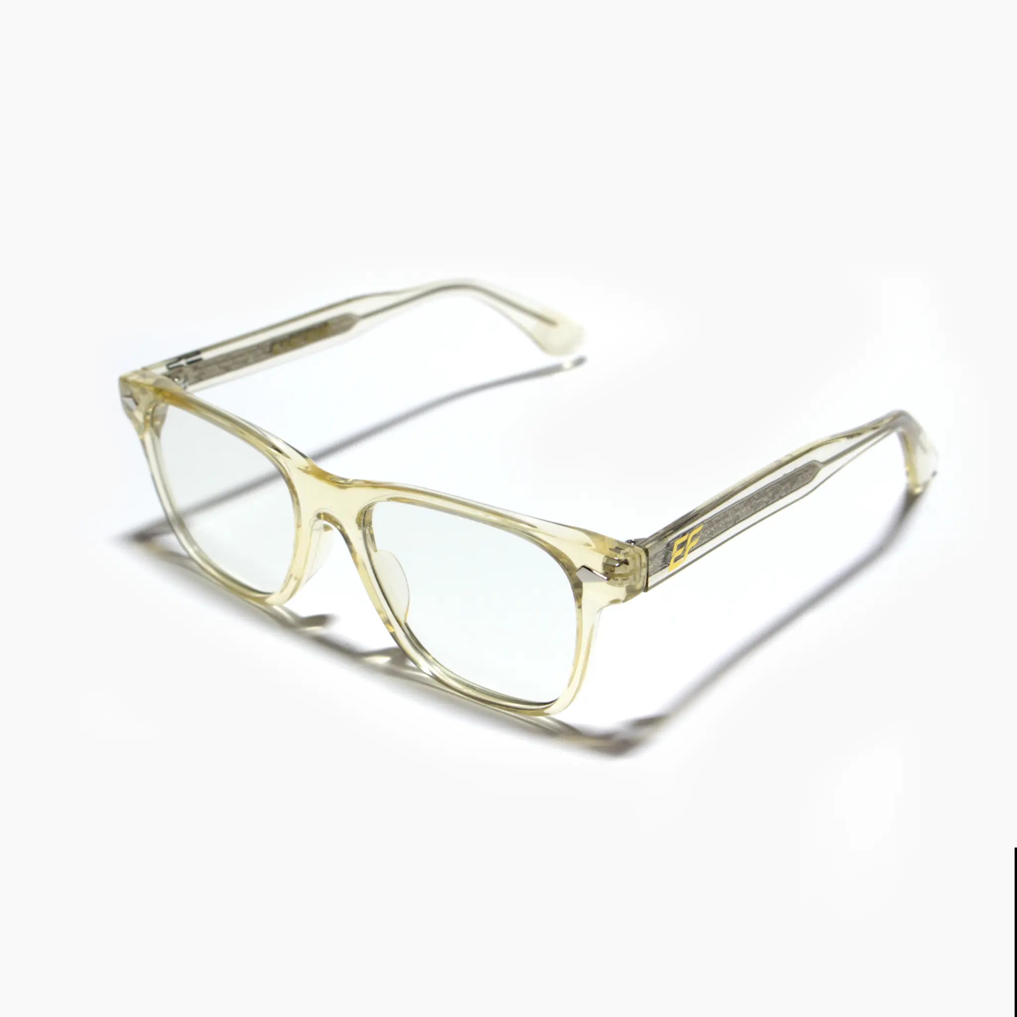EyeFend premium photochromic blue light glasses in a rectangular translucent frame, featuring a minimalist structural design and durable multi-barrel rivet hinges.